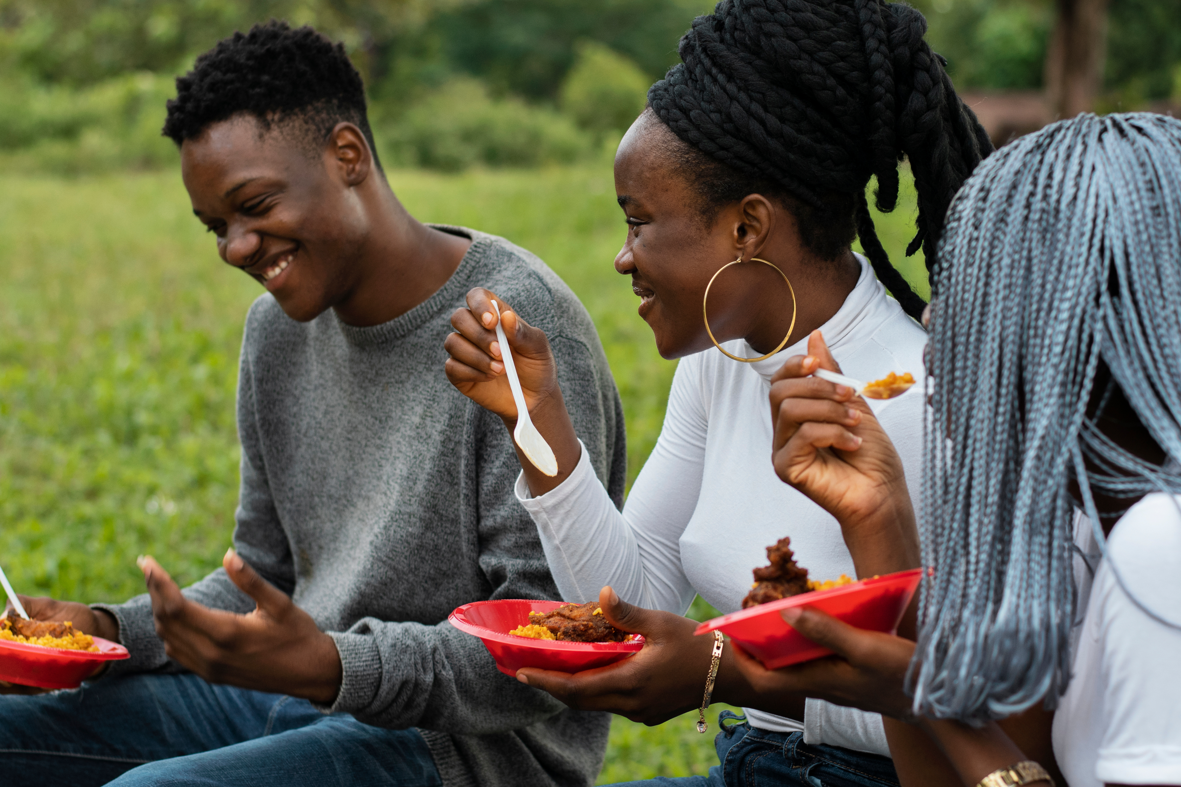 Community members eating nutritious food